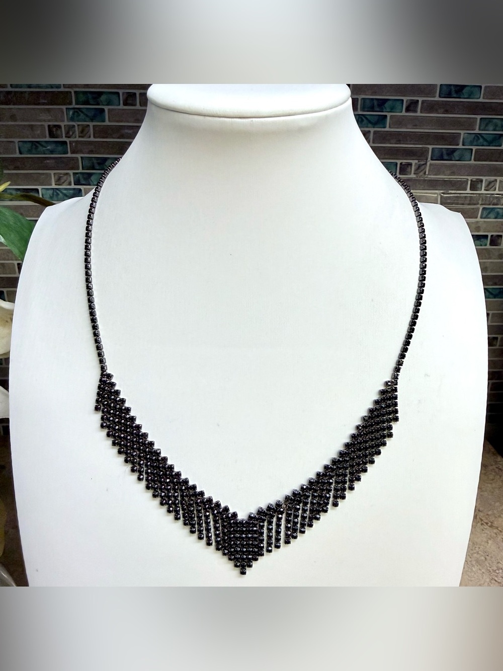Black rhinestone cascading fringe bib necklace